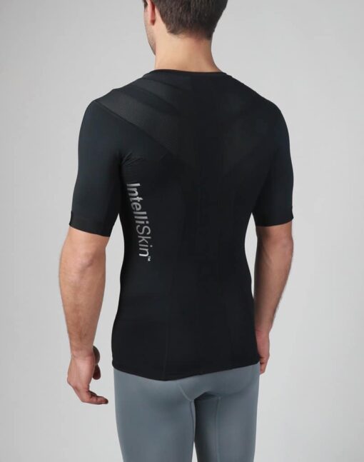 Intelliskin holdningskorrigerende t-shirt med lynlås - Foundation 2.0 i sort set skråt bagfra i studio